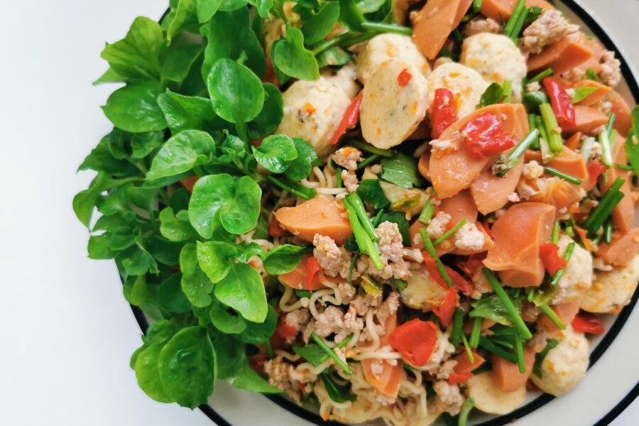 Appetizing healthy rice noodles and salmon salad